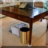 F18. Baker Furniture leather top partners desk. 28”h x 64”w x 45”d 